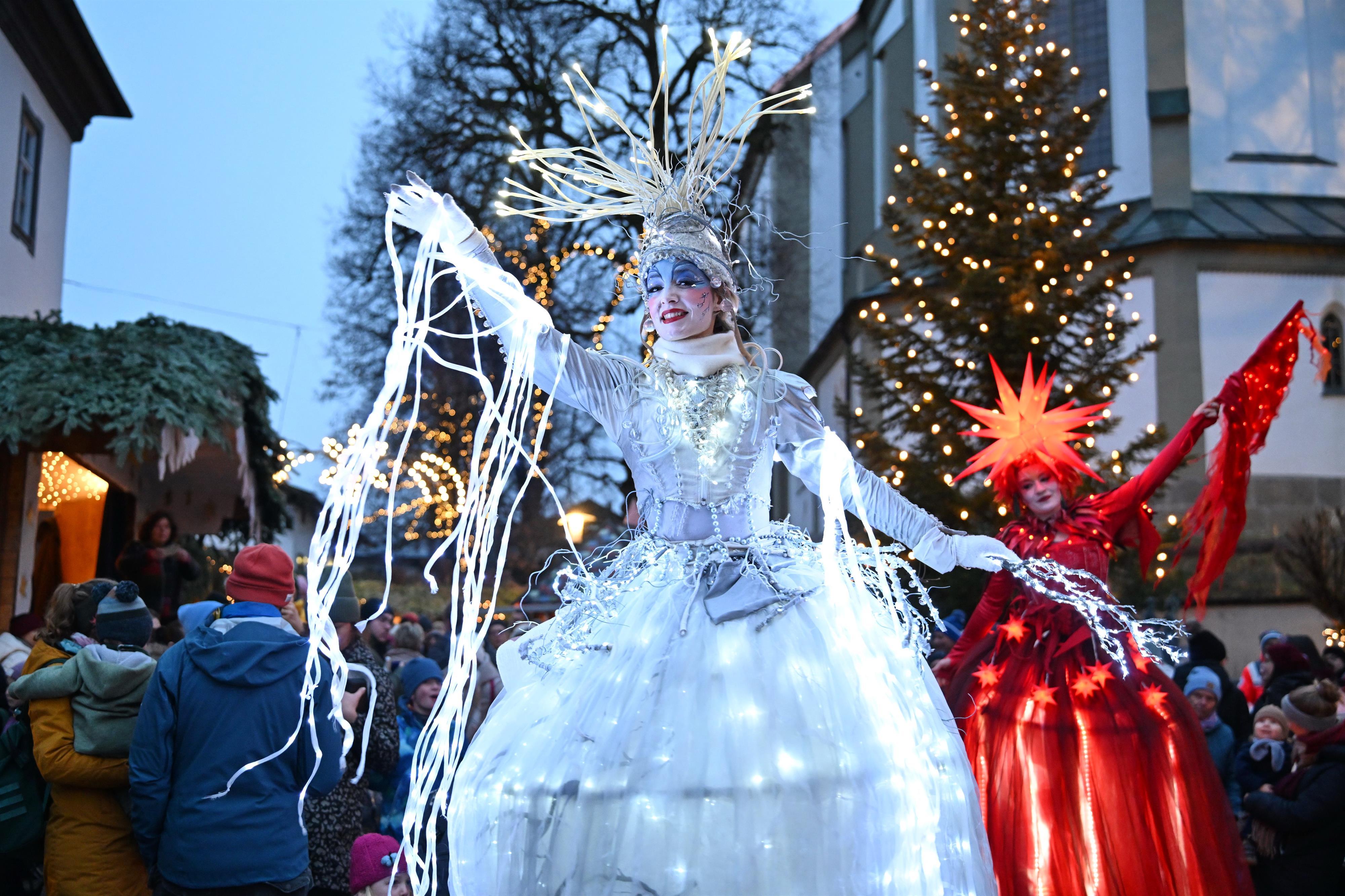 Lichtkostüme Weihnachtsmarkt